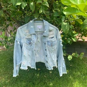 light denim ripped jean jacket